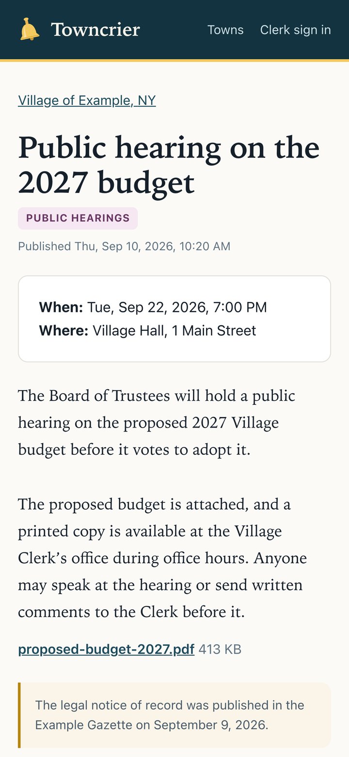 A Village of Example public hearing notice opened in a phone’s web browser without the app: its title, when and where, the text, an attached budget file and where the legal notice of record ran.